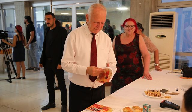 Töre, Bülent Günkut’un kitap tanıtımı ve fotoğraf sergisine katıldı